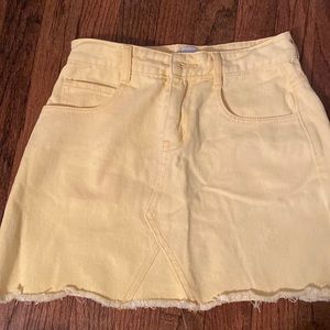 PRINCESS POLLY: yellow denim mini skirt